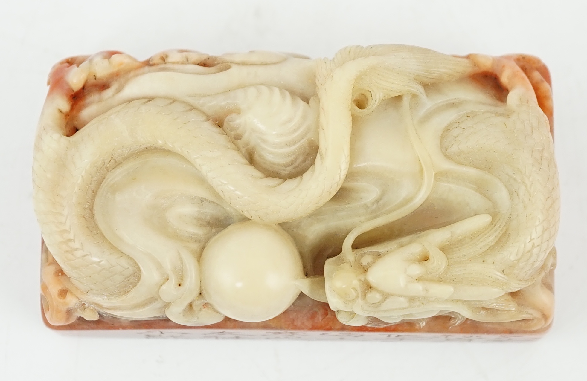 A Chinese 'dragon' soapstone inscribed seal